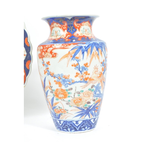 50 - A collection of Japanese Imari style ceramic items. Comprising of vases, various size charger plates... 