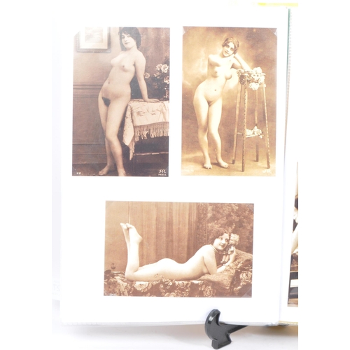 527 - A collection of thirty four reproduction 20th century French nude erotic postcards cartes erotique. ... 