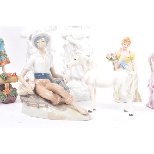 53 - A collection of vintage 20th century porcelain china figurines. To include, ballerinas, clowns, baby... 