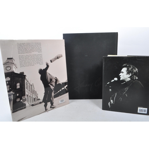 532 - Johnny Cash & Rolling Stone musical interest. A collection of three books on Johnny Cash. The lot co... 