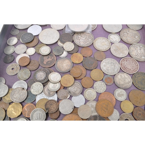 546 - A collection of British and Foreign currency coins. The collection to include an 1820 King George II... 