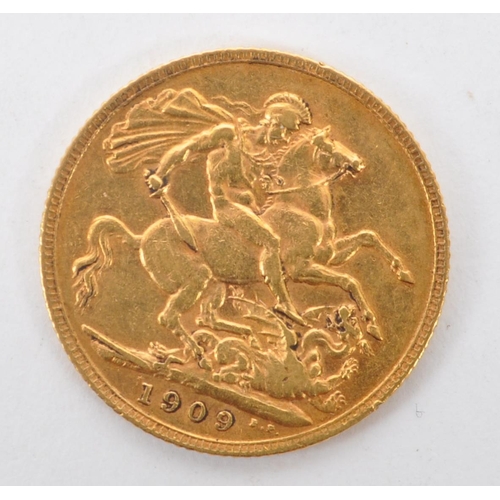 548 - A 1909 Edward VII 22ct gold full sovereign coin. Reverse right profile of king reading Edwardvs VII ... 