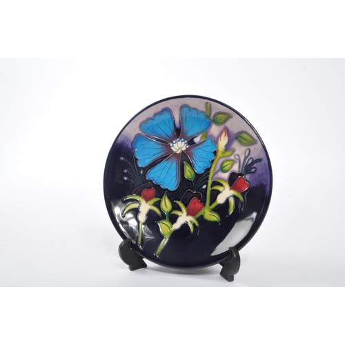 62 - Moorcroft Pottery - Stoke on Trent, England - A contemporary ceramic pottery hand painted pin dish /... 