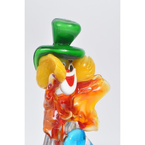 66 - A collection of five studio art glass Murano clown figures. Each on black feet in standing position,... 