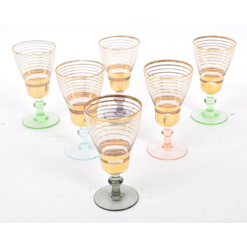 68 - A collection of mid 20th century drinking glasses. The collection to include a selection of glasses,... 