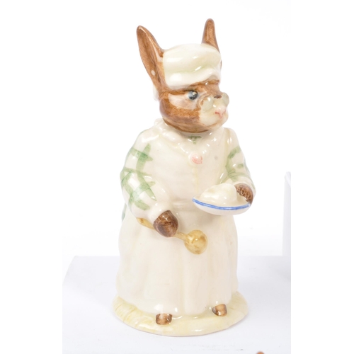 77 - Royal Doulton - Bunnykins - A collection of porcelain china bunny figurines / statues. Comprising of... 