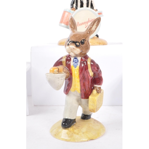 77 - Royal Doulton - Bunnykins - A collection of porcelain china bunny figurines / statues. Comprising of... 