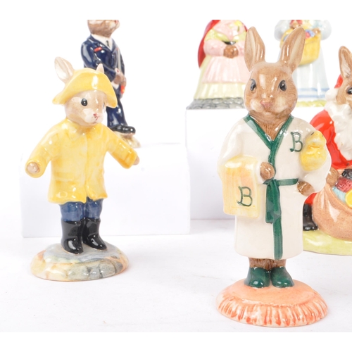 79 - Royal Doulton - Bunnykins - A collection of porcelain china bunny figurines / statues. Comprising of... 