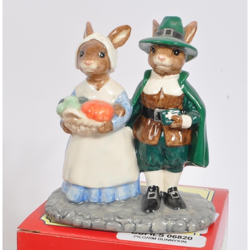 82 - Royal Doulton - Bunnykins - A collection of porcelain china figurines / statues. Comprising of bath ... 