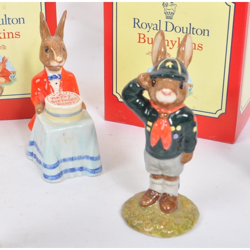 82 - Royal Doulton - Bunnykins - A collection of porcelain china figurines / statues. Comprising of bath ... 