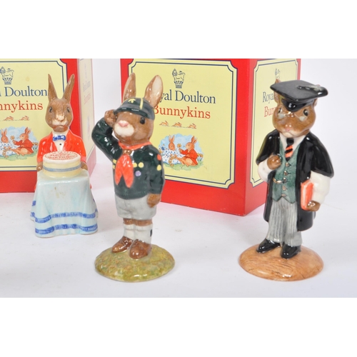 82 - Royal Doulton - Bunnykins - A collection of porcelain china figurines / statues. Comprising of bath ... 