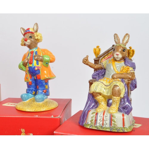 86 - Royal Doulton - Bunnyknis - Collection of porcelain china animal rabbit figurines / statues. Compris... 