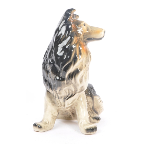 9 - A vintage mid 20th century circa 1960s ceramic pottery figure of a dog. Rough collie breed, in a sea... 