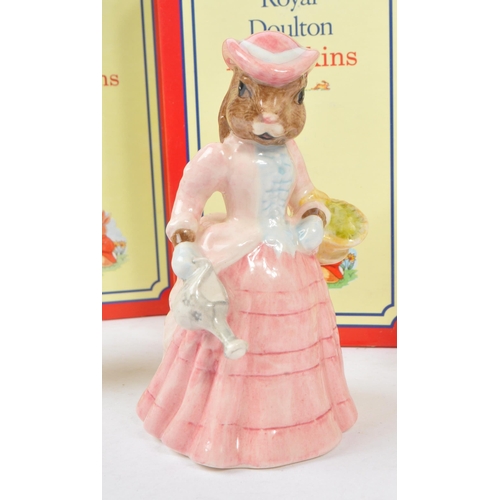 97 - Royal Doulton - Bunnykins - A collection of three porcelain china bunny animal figurines / statues. ... 