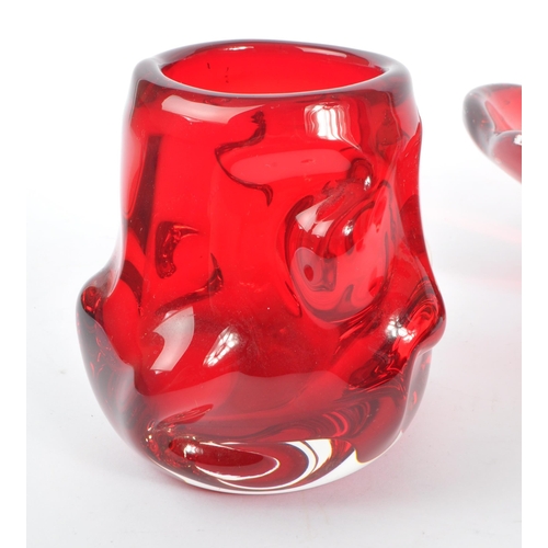 151 - Whitefriars - squat design ruby red glass knobbly vase, pattern # 9608 together with a ruby red bubb... 