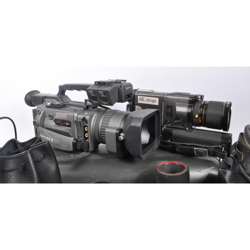 276 - A large collection of assorted digital camcorders. The collection including a Canon Video Lens 3x Zo... 