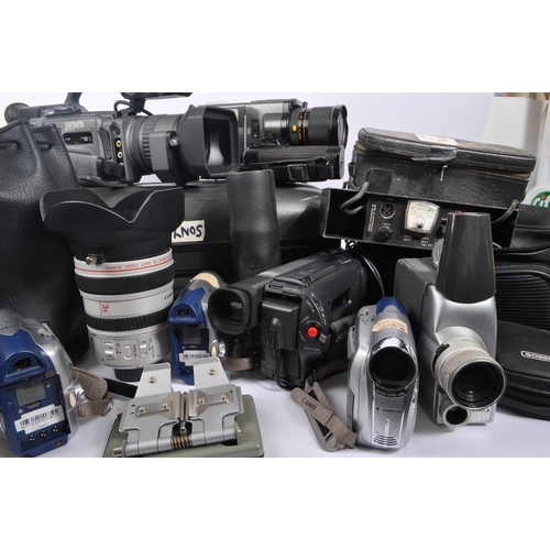 276 - A large collection of assorted digital camcorders. The collection including a Canon Video Lens 3x Zo... 