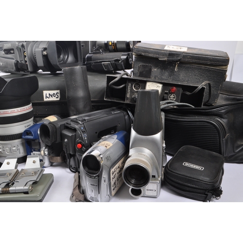 276 - A large collection of assorted digital camcorders. The collection including a Canon Video Lens 3x Zo... 