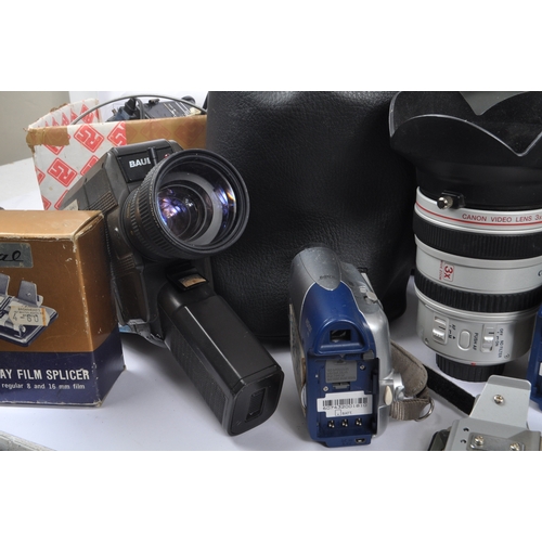 276 - A large collection of assorted digital camcorders. The collection including a Canon Video Lens 3x Zo... 