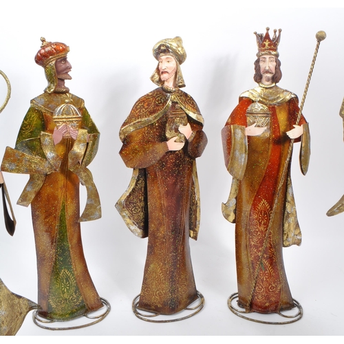 317 - A collection of religious figures ornaments Christmas decorations. To include some members of the Na... 