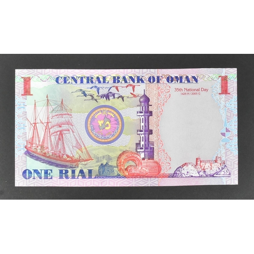 488 - A collection of international uncirculated bank notes banknotes to include; 1x 1977 Oman 100 baisa, ... 