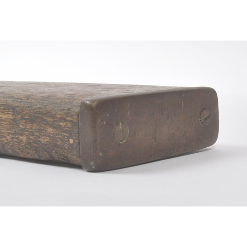 303 - A vintage mid 20th century oak spirit level. Long rectangular form with bubble to centre. Measures a... 