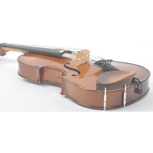 418 - Stentor - A 20th Century Stentor student 3/4 size violin with two piece back and ebonised fingerboar... 