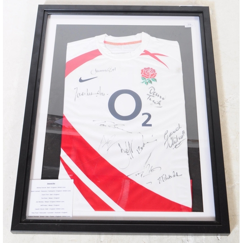 319 - Of sporting interest - A signed England rugby shirt held within frame with signatures from Jeremy Gu... 