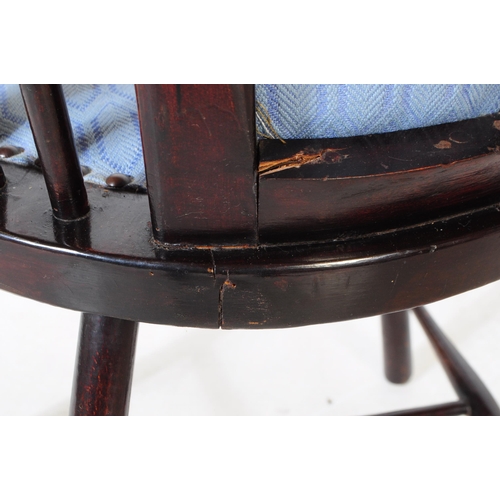 1021 - Two early 20th century Arts and Crafts beech wood ebonised armchairs. The chairs each having blue fa... 