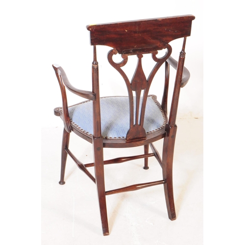 1021 - Two early 20th century Arts and Crafts beech wood ebonised armchairs. The chairs each having blue fa... 