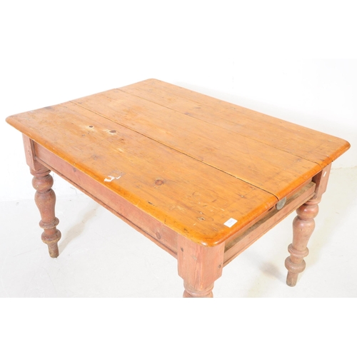 1026 - A Victorian 19th century scrub pine kitchen / dining table. Rectangular form with flared top, single... 