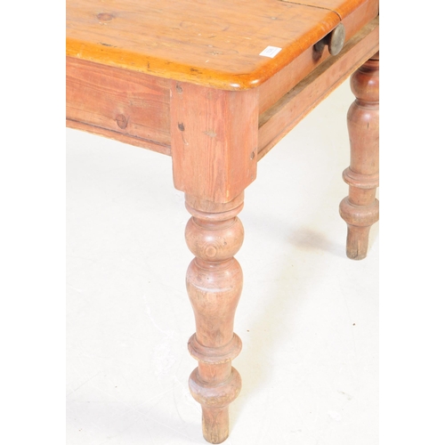 1026 - A Victorian 19th century scrub pine kitchen / dining table. Rectangular form with flared top, single... 