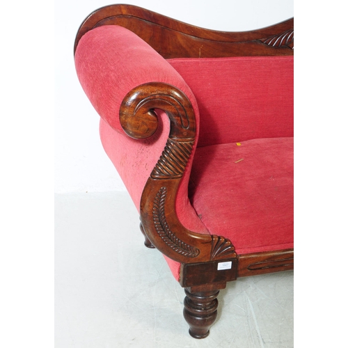 1027 - A Victorian 19th century mahogany three seater sofa / settee. With arched curved backrest with carve... 