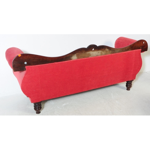 1027 - A Victorian 19th century mahogany three seater sofa / settee. With arched curved backrest with carve... 