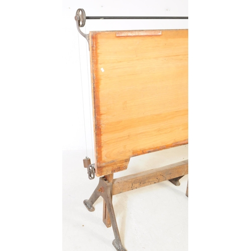 1031 - An early 20th century Draughtsman's architectural drafter writing table. Having a large rectangular ... 