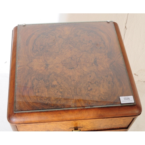 1035 - An early 20th century 1930s Art Deco burr walnut bedside table / cupboard. The bedside raised on cab... 