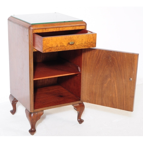 1035 - An early 20th century 1930s Art Deco burr walnut bedside table / cupboard. The bedside raised on cab... 