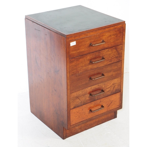 1036 - An mid 20th century government / ministry of defence oak bedside / pedestal chest of drawers. Having... 