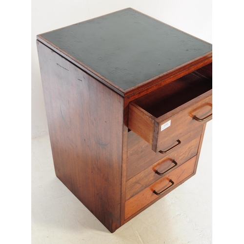 1036 - An mid 20th century government / ministry of defence oak bedside / pedestal chest of drawers. Having... 