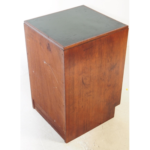 1036 - An mid 20th century government / ministry of defence oak bedside / pedestal chest of drawers. Having... 