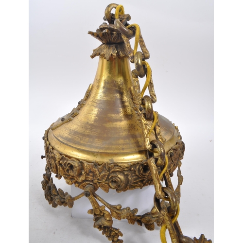 1041 - A 19th Century French ormolu pendant light with frosted cut glass shade. The light of circular form ... 