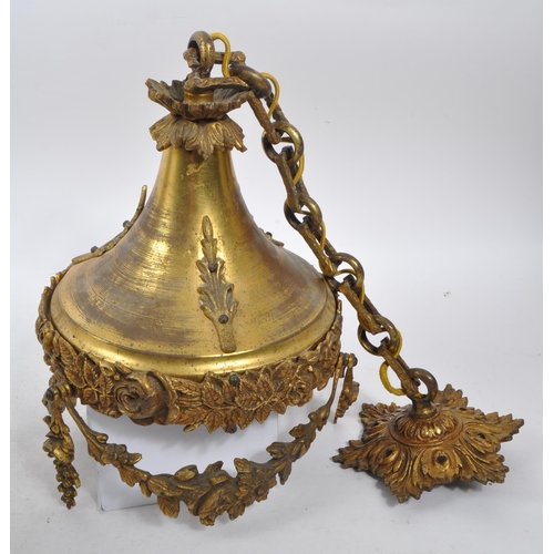 1041 - A 19th Century French ormolu pendant light with frosted cut glass shade. The light of circular form ... 