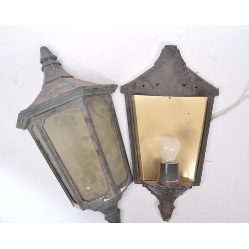 1042 - A large Victorian metal and glass 19th Century lantern wall light in the style of a street lamp, hav... 