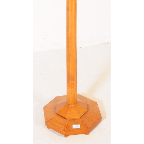 1043 - Art Deco style oak floor standing standard lamp light. With light fitting to top, with tapering octa... 