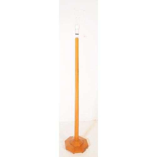 1043 - Art Deco style oak floor standing standard lamp light. With light fitting to top, with tapering octa... 