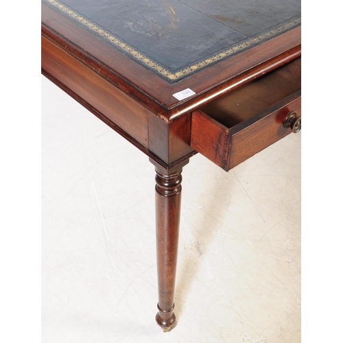 1044 - A George III mahogany large writing table / desk. Rectangular form with leather inset skiver with gi... 