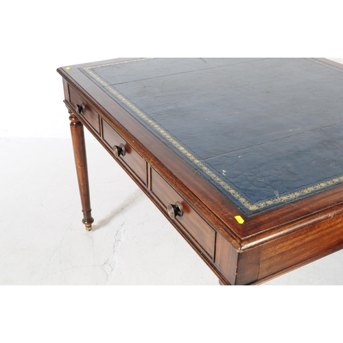 1044 - A George III mahogany large writing table / desk. Rectangular form with leather inset skiver with gi... 