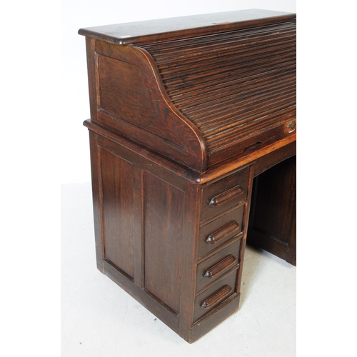 1046 - Early 20th century Art Deco roll top tambour writing table / desk. Oak construction with sloped top ... 