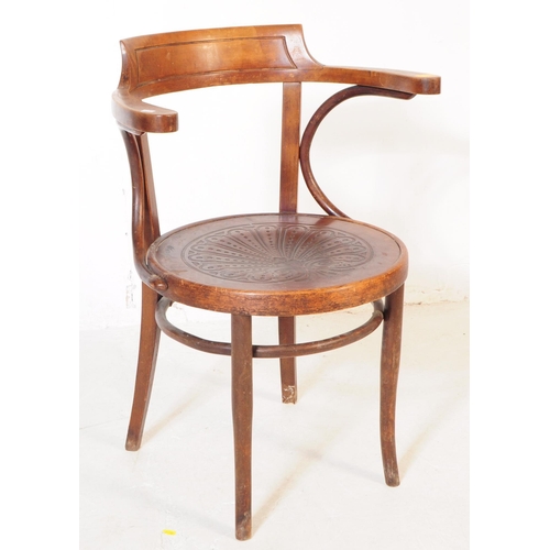 1047 - A set of three mid 20th century bistro Thonet manner bentwood armchairs. Having wrap around tub chai... 