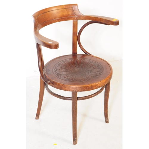 1047 - A set of three mid 20th century bistro Thonet manner bentwood armchairs. Having wrap around tub chai... 